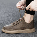 **Tênis Masculino de Couro Genuíno - Estilo e Conforto com Agostini**