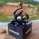 Molinete Shimano com Drag de Até 15kg e 19 Rolamentos para Rotação Suave + Óculos de Sol Polarizado Grátis para Aventura ao Ar Livre