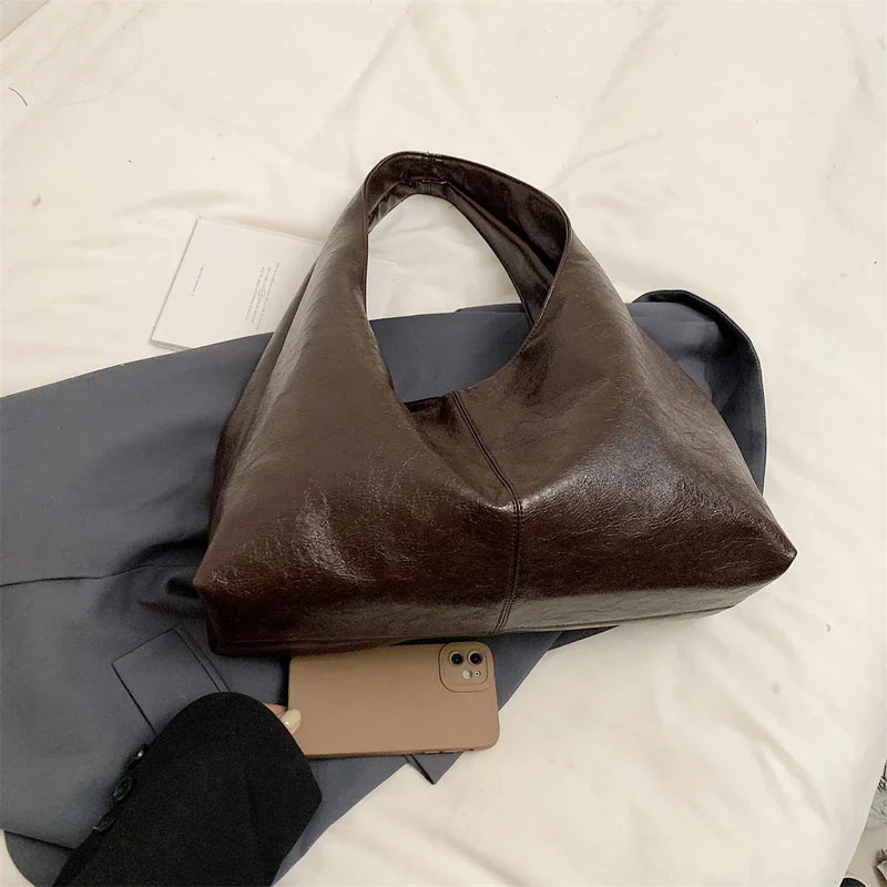 Bolsa Grande Liz: Conforto e Estilo para o Seu Dia a Dia