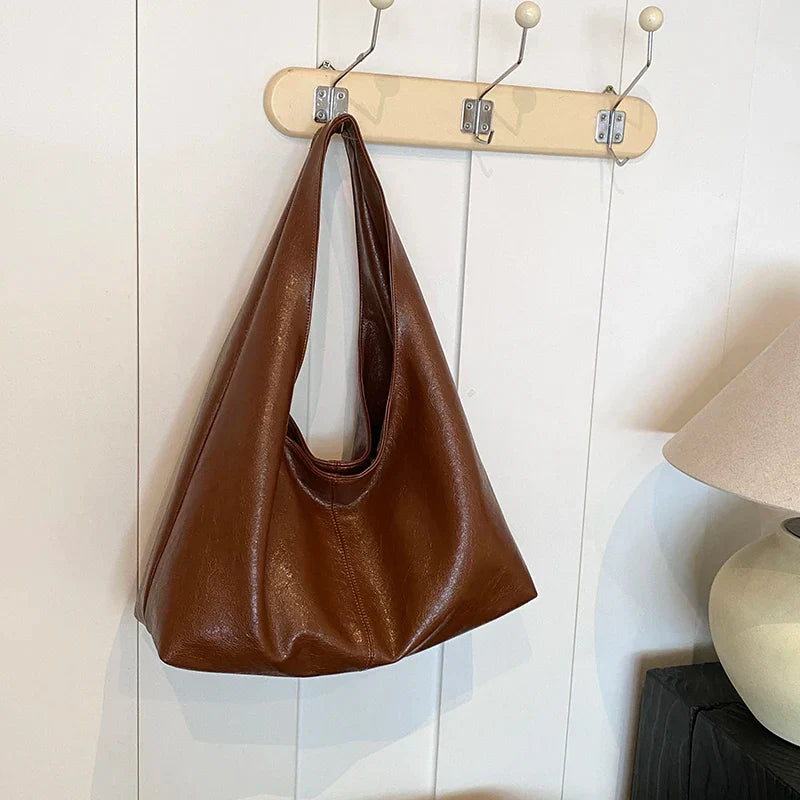 Bolsa Grande Liz: Conforto e Estilo para o Seu Dia a Dia