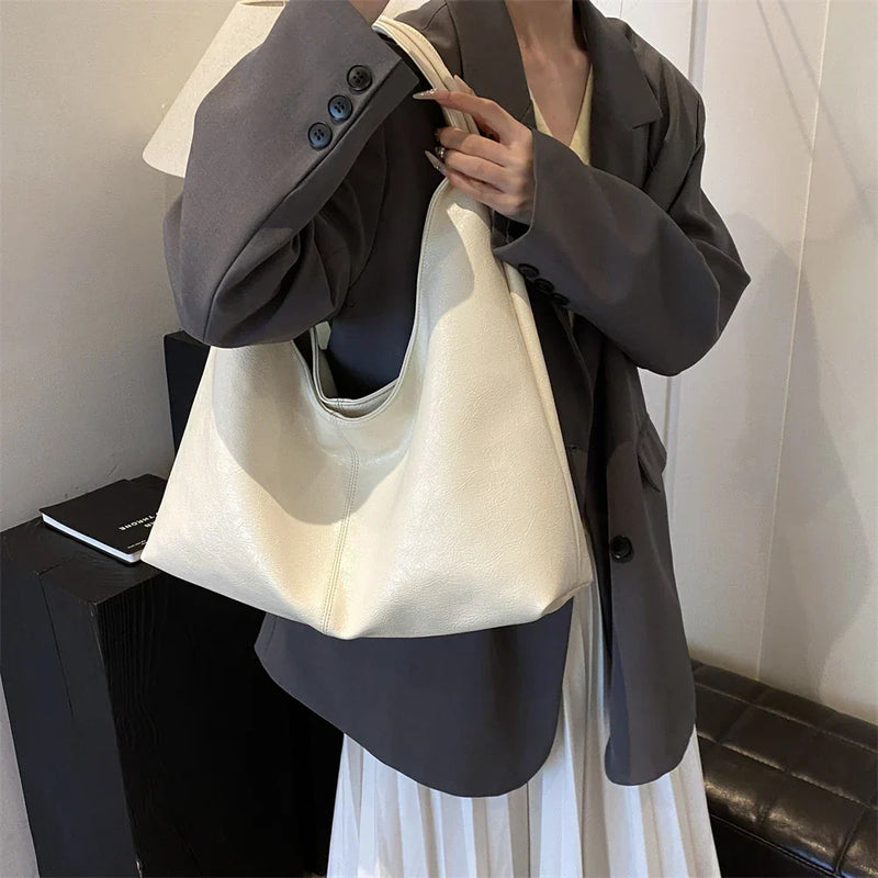 Bolsa Grande Liz: Conforto e Estilo para o Seu Dia a Dia