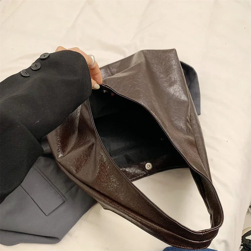 Bolsa Grande Liz: Conforto e Estilo para o Seu Dia a Dia