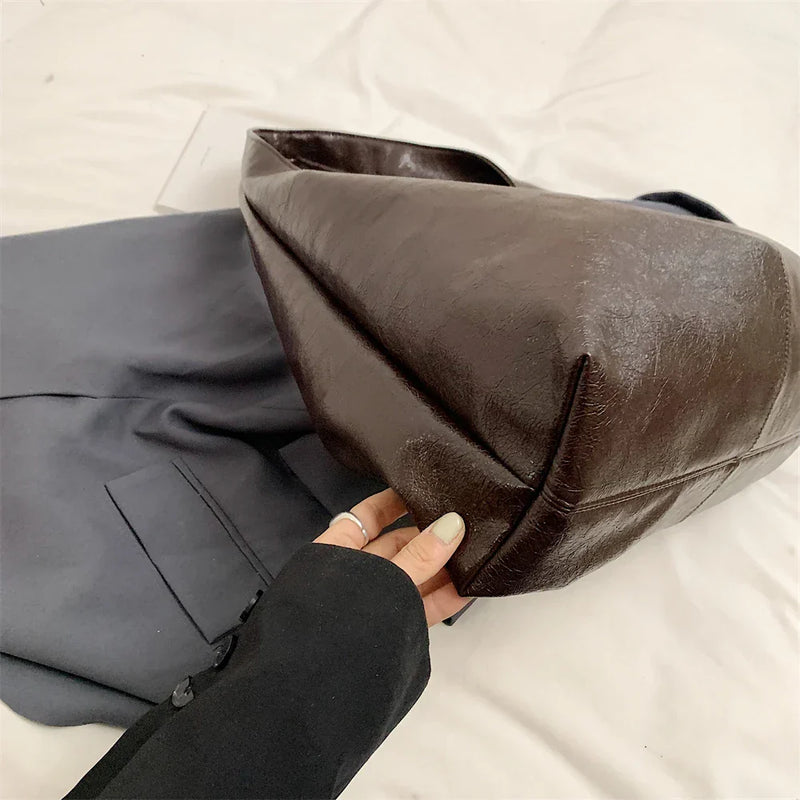 Bolsa Grande Liz: Conforto e Estilo para o Seu Dia a Dia