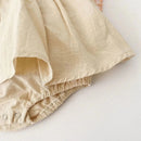 Body Infantil Madalena Conforto em Branco e Bege