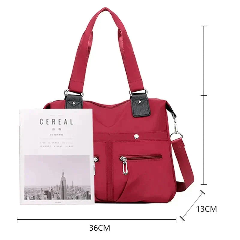 Bolsa Feminina Impermeável Myla + Brinde Exclusivo