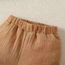 Conjunto Infantil Bege com Dinossauros: Conforto e Diversão para Pequenos Aventureiros