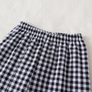 Conjunto Infantil Estampado: Regata com Laço e Calça Xadrez para Conforto e Estilo