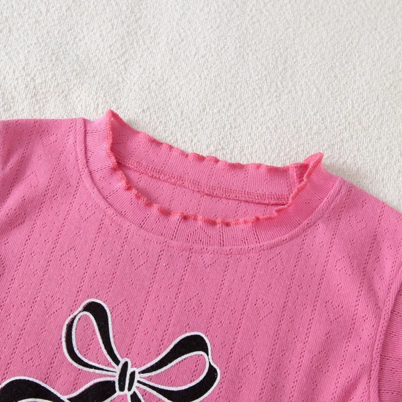 Conjunto Infantil Estampado: Regata com Laço e Calça Xadrez para Conforto e Estilo