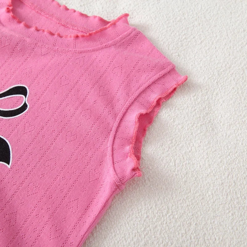 Conjunto Infantil Estampado: Regata com Laço e Calça Xadrez para Conforto e Estilo