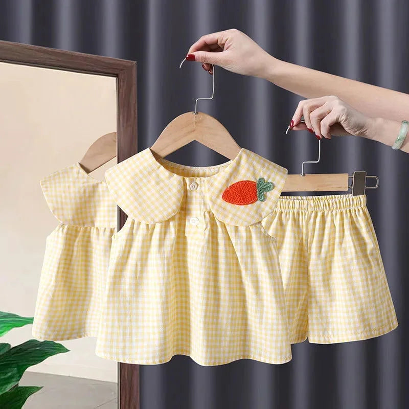 Conjunto Infantil Xadrez Amarelo com Bordado: Estilo e Conforto para Crianças