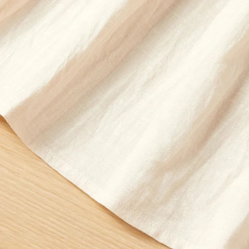 Vestido Infantil Bordado Abigail em Bege: Conforto e Estilo para Pequenas Donzelas